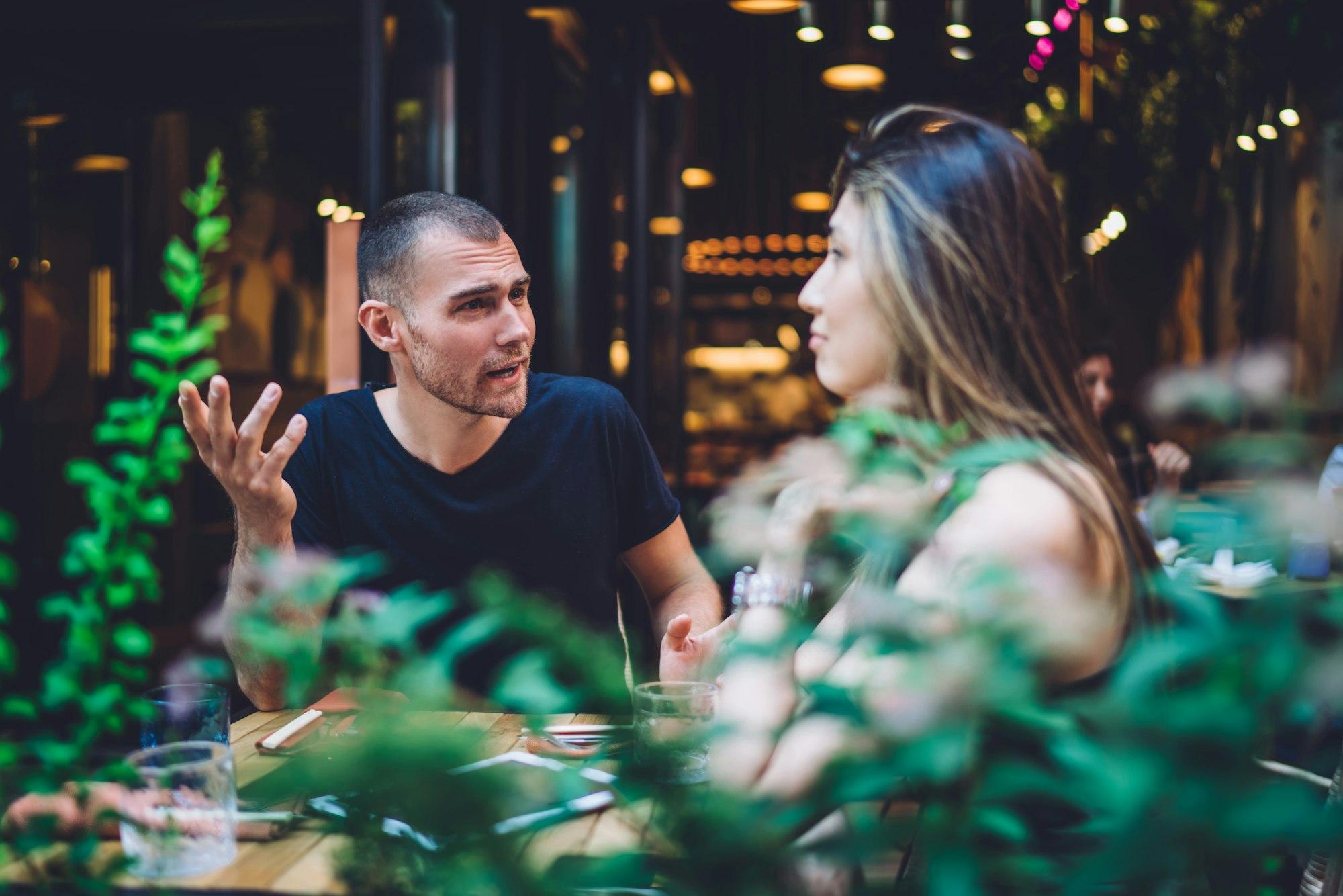 unsmile couple gesturing during disagreement meeting for solving problems