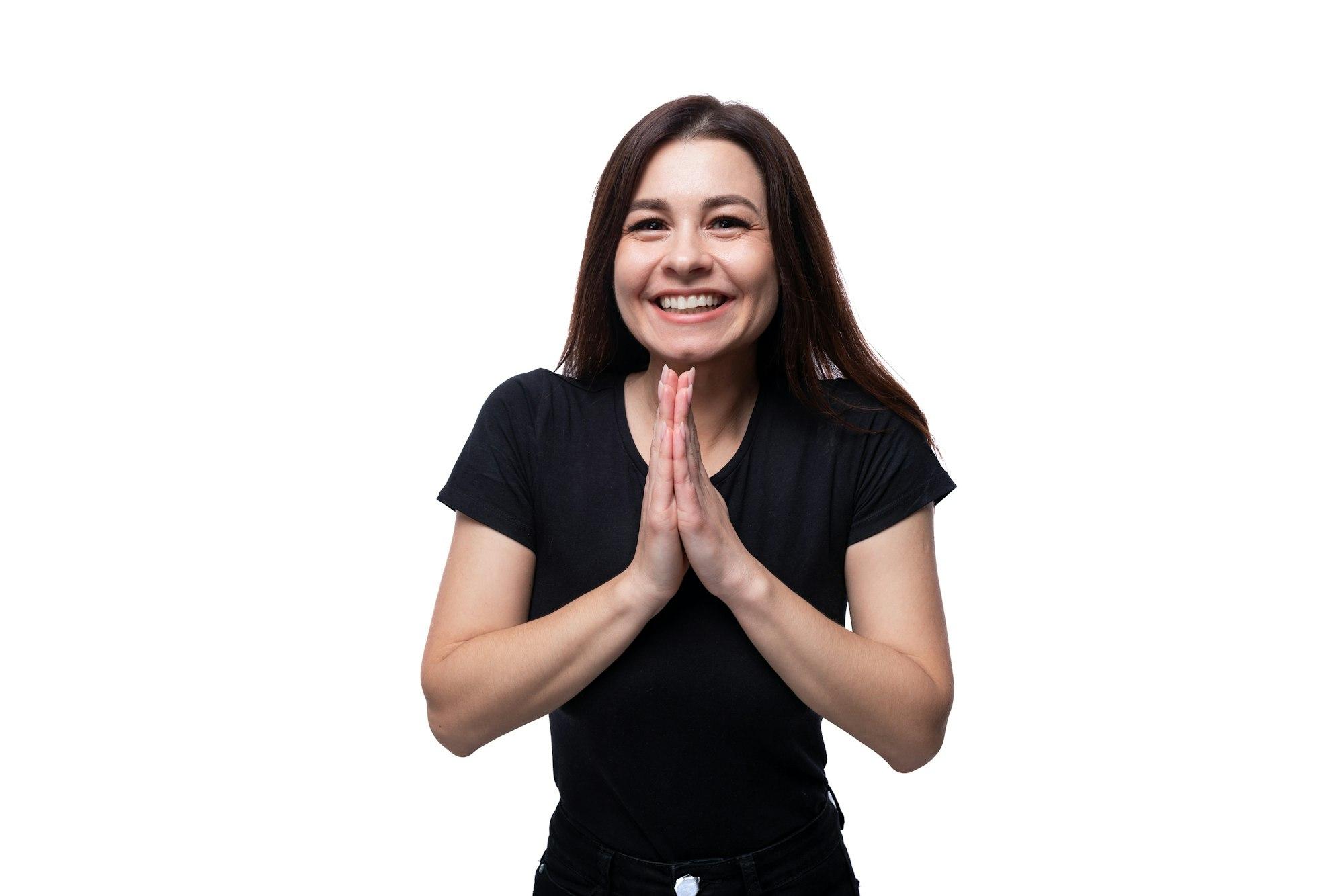 Happy young brunette woman in love wearing black t-shirt