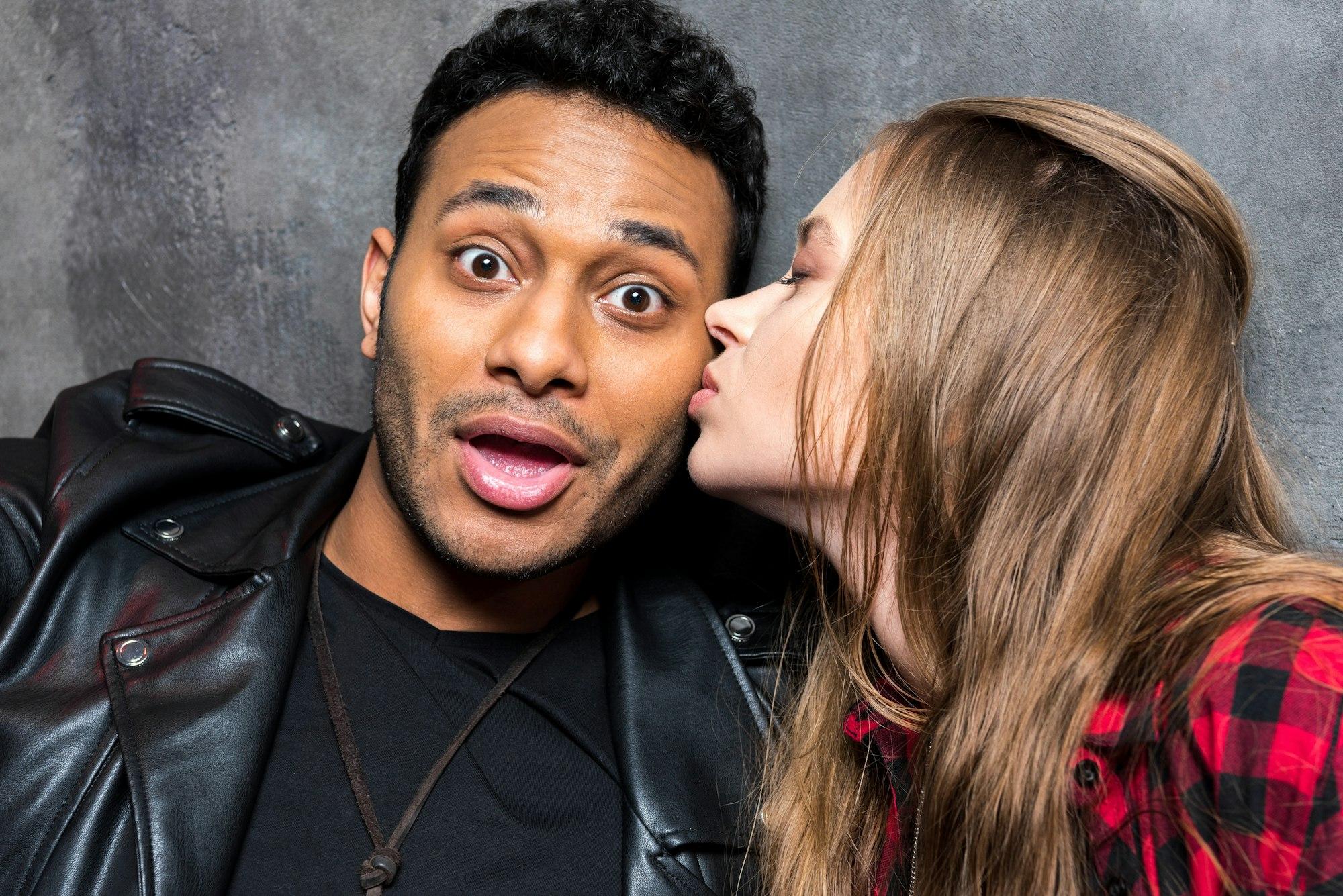 portrait of young stylish man and woman in love