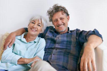 Portrait of an affectionate senior couple sitting together in their home