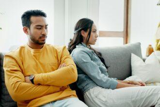 Conflict, fight and couple angry on a couch together duo to infertility, argument and toxic relatio