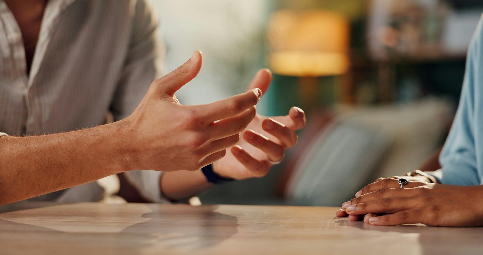 Couple, hands and dispute with anxiety, stress and drama at home or apartment. Frustrated, woman an