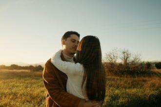 Romantic Couple Hugging at sunset