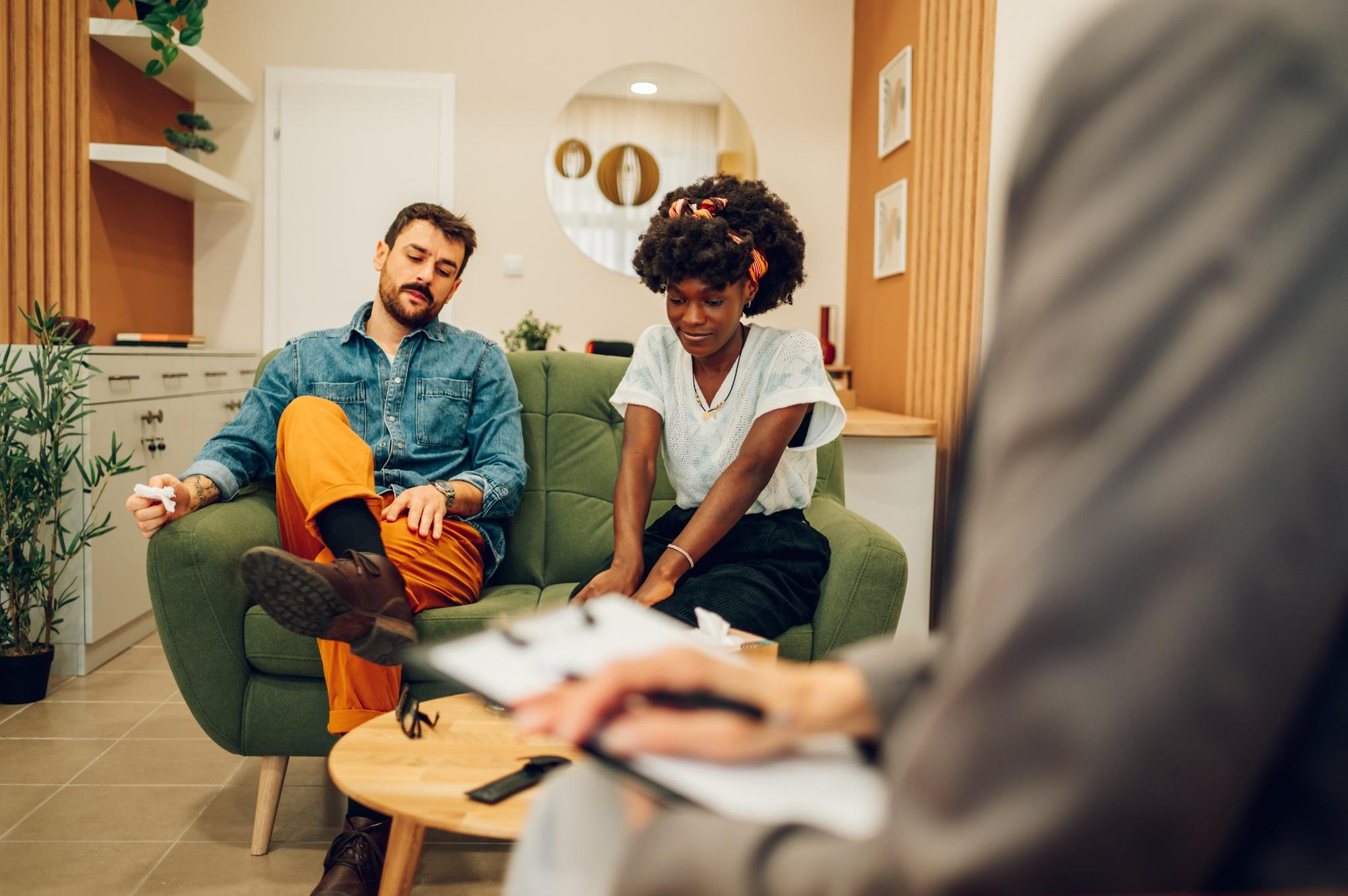 Diverse couple on a therapy session in a psychologist office