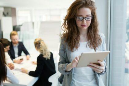 Elegant smart businesswoman in company office