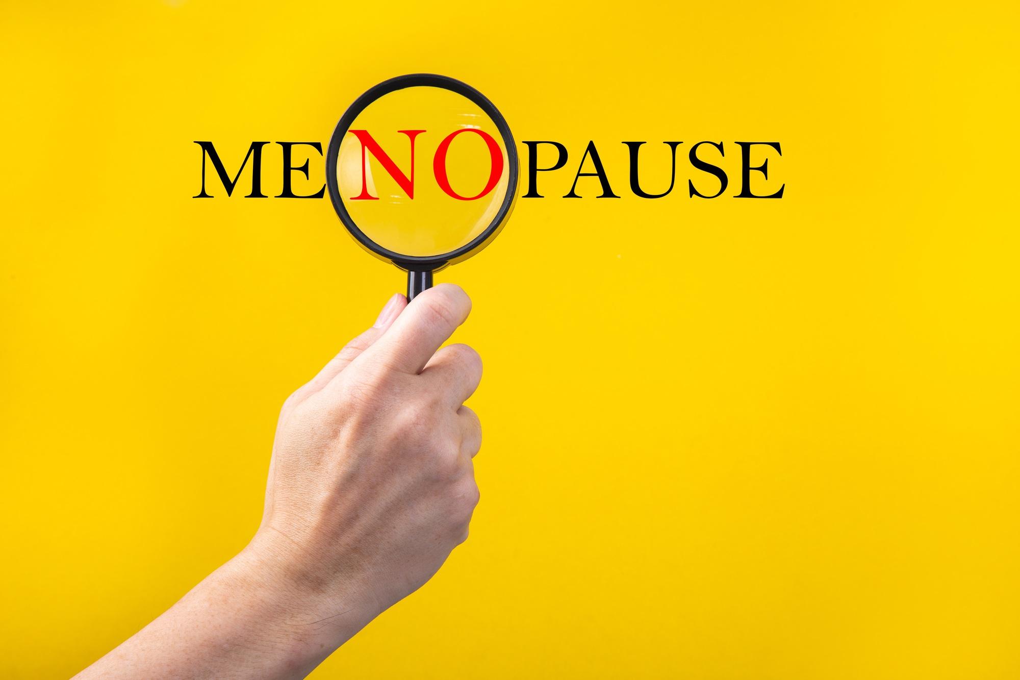 The word Menopause through a magnifying glass