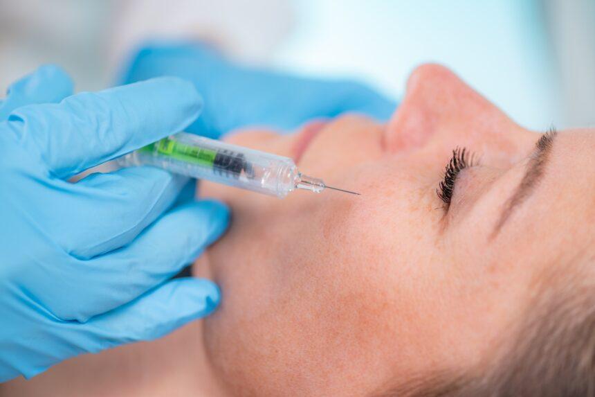 Plumping up cheeks with hyaluronic acid treatment
