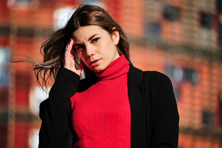 Woman looking with serious face to the camera.